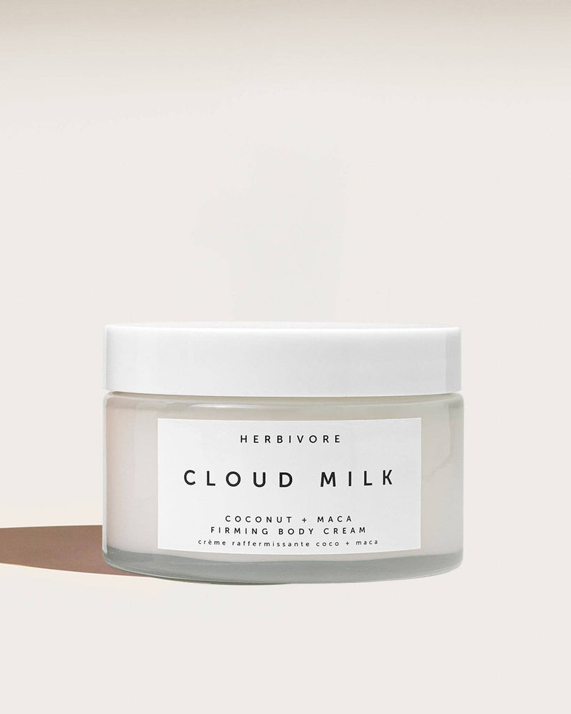 Herbivore Cloud Milk body cream jar on a white background